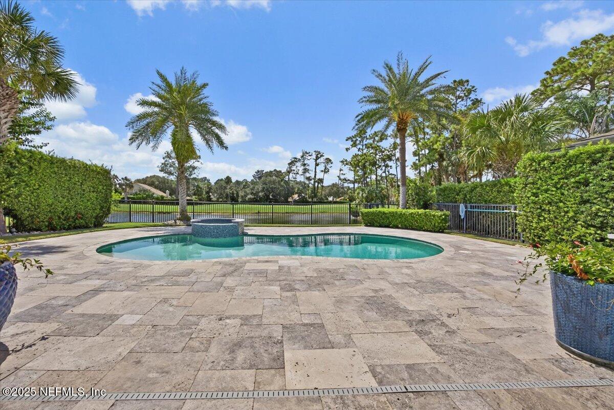 604 Timber Bridge Lane Atlantic Beach, FL 32233 - Photo 33 of 46 a view of a fountain in front of a house