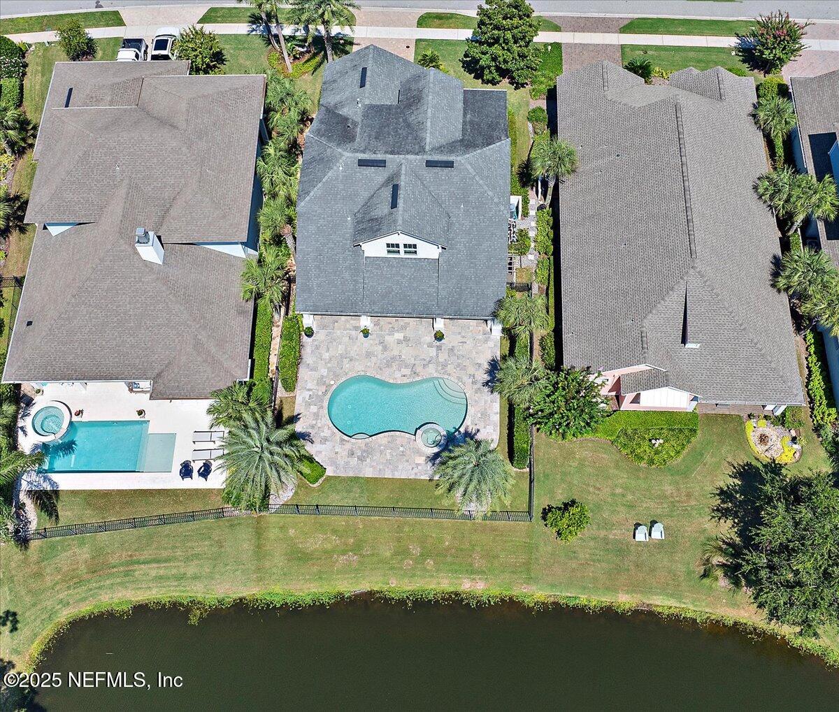 604 Timber Bridge Lane Atlantic Beach, FL 32233 - Photo 37 of 46 an aerial view of residential houses with outdoor space and swimming pool