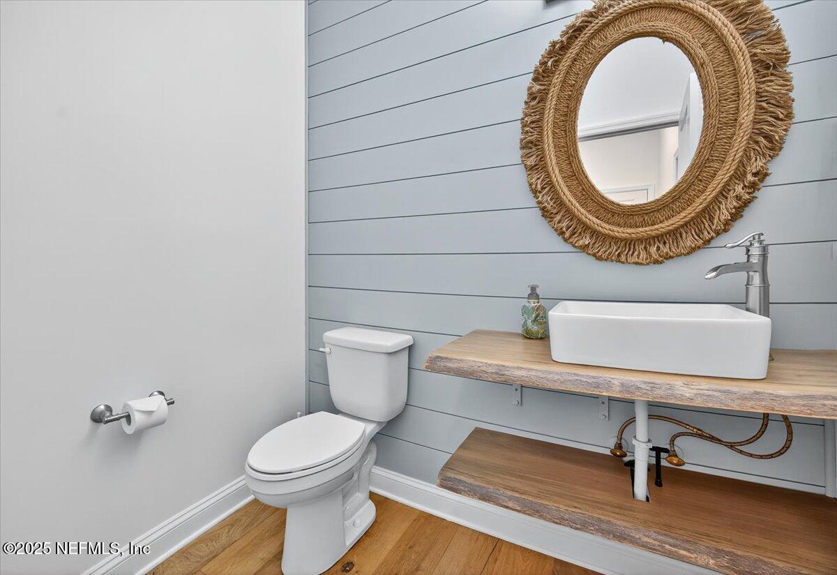 604 Timber Bridge Lane Atlantic Beach, FL 32233 - Photo 7 of 46 a bathroom with a toilet and a sink
