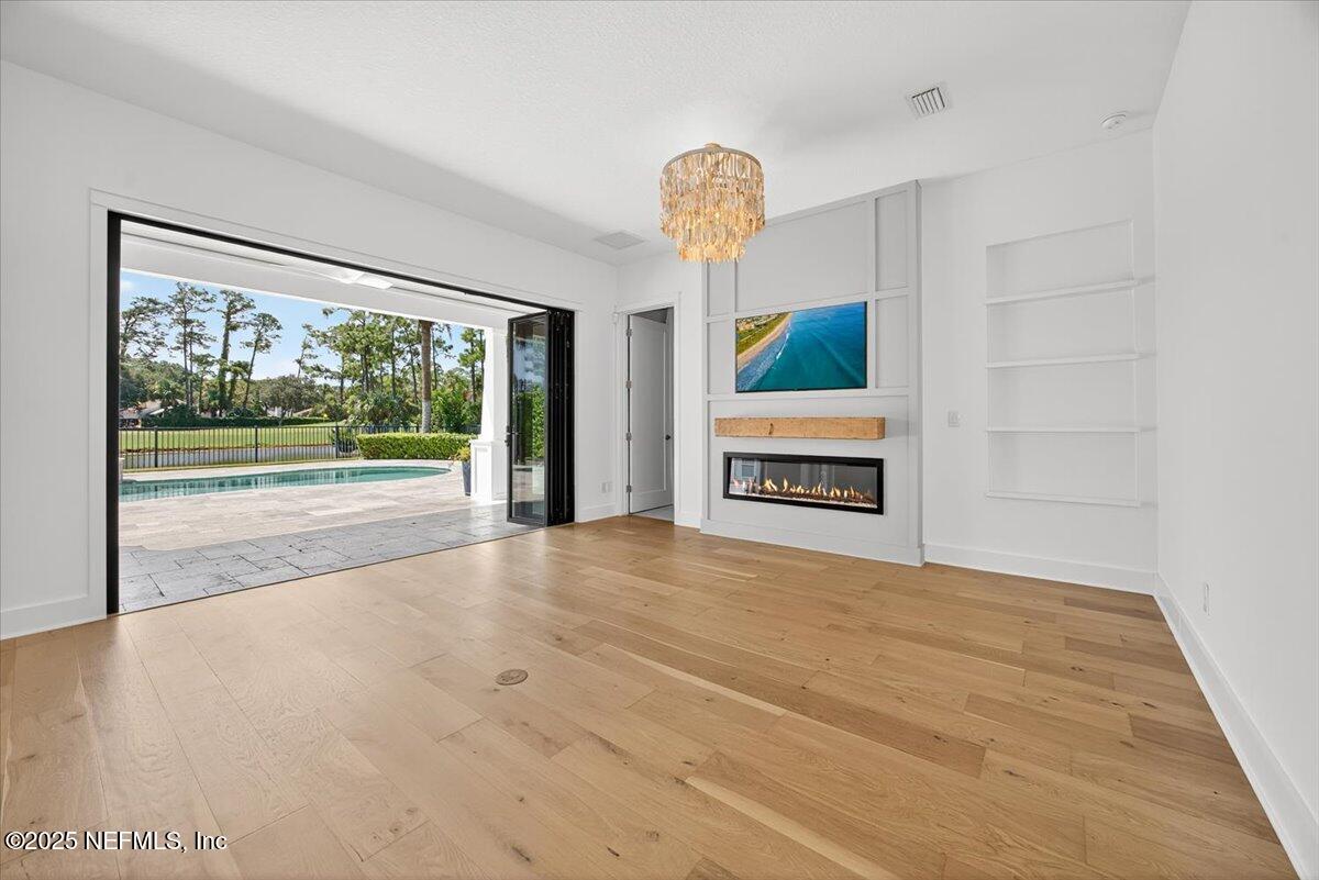 604 Timber Bridge Lane Atlantic Beach, FL 32233 - Photo 10 of 46 a view of an empty room with a window