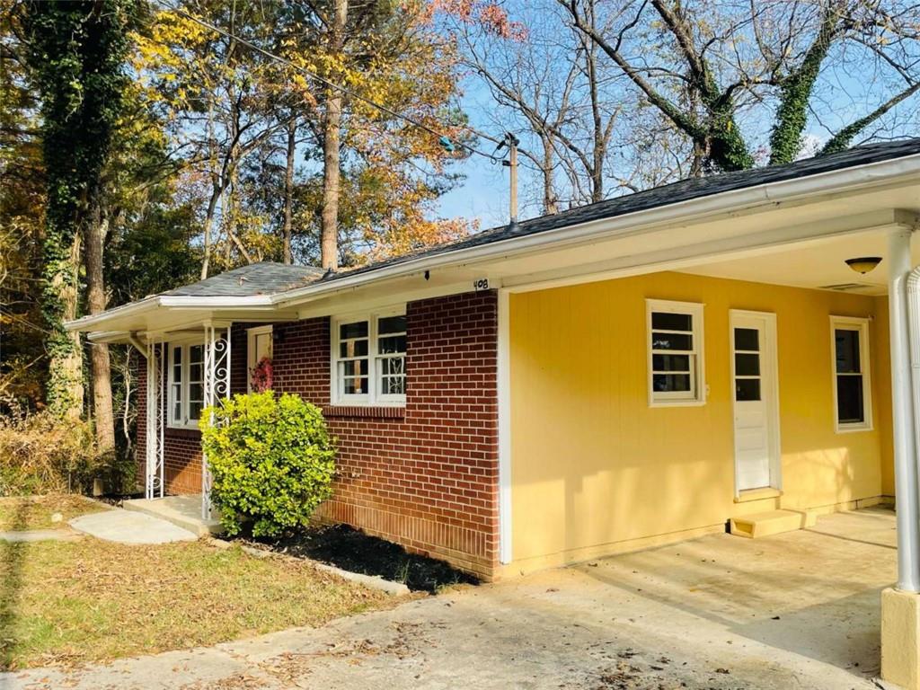 408 Reece Street Northeast Rome, GA 30161 - Photo 12 of 12 a front view of a house with a yard
