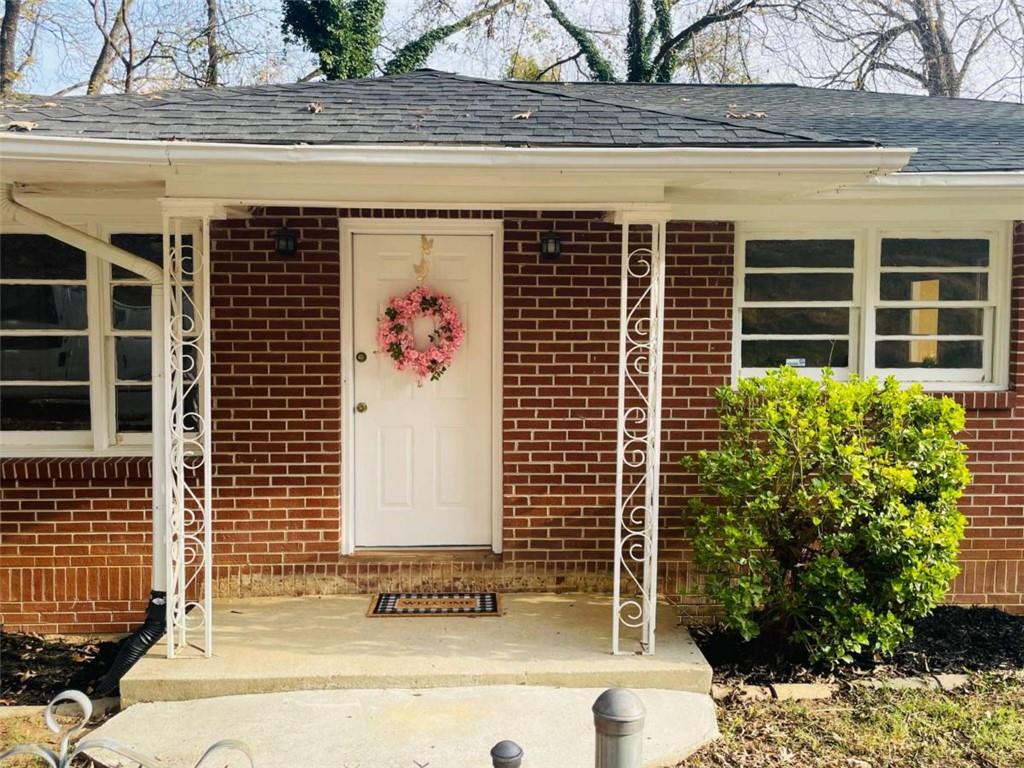 408 Reece Street Northeast Rome, GA 30161 - Photo 2 of 12 a front view of a house