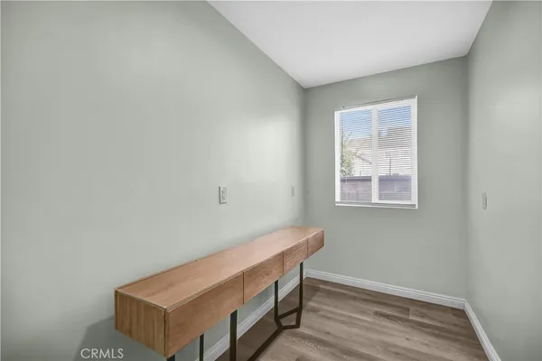 a room with a table and a window