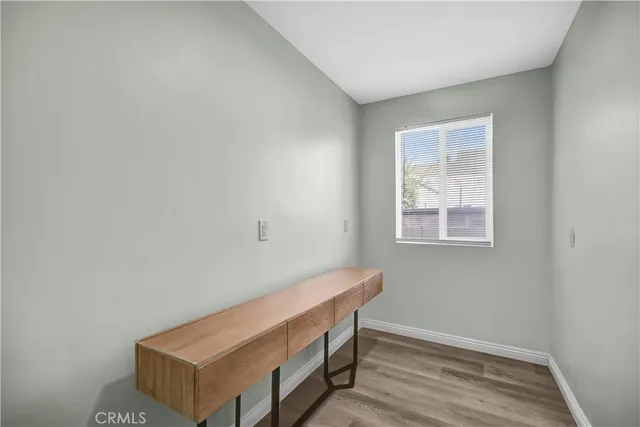 a room with a table and a window