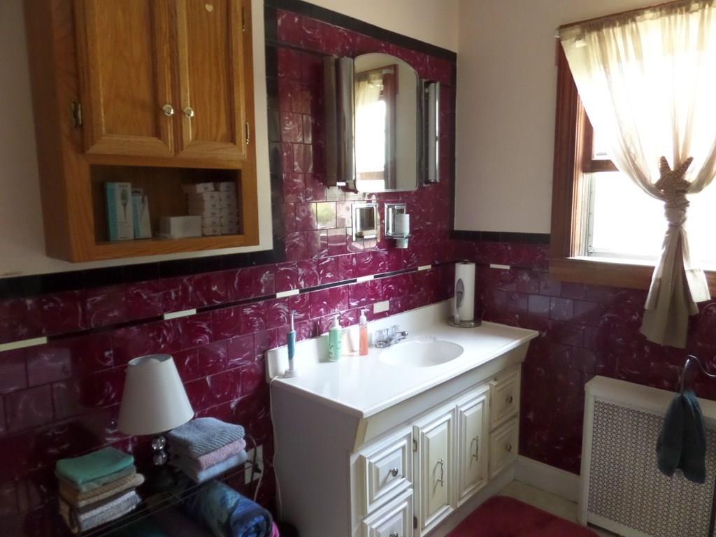 460 Worcester Road Barre, MA 01005 - Photo 15 of 21 a bathroom with a sink and a mirror