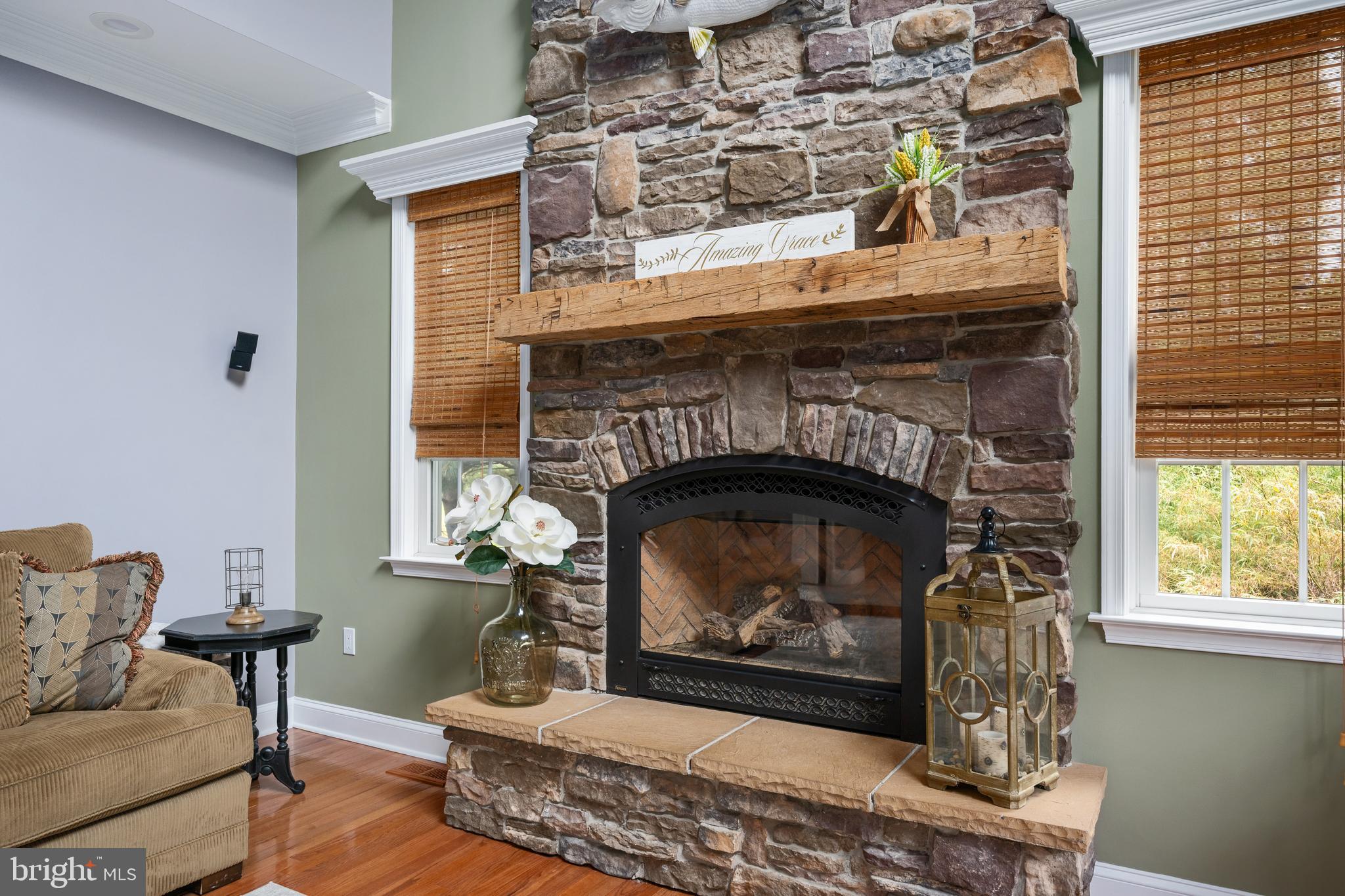 3889 Gamber Road Finksburg, MD 21048 - Photo 22 of 76 a living room with a fireplace wooden floor and a fireplace