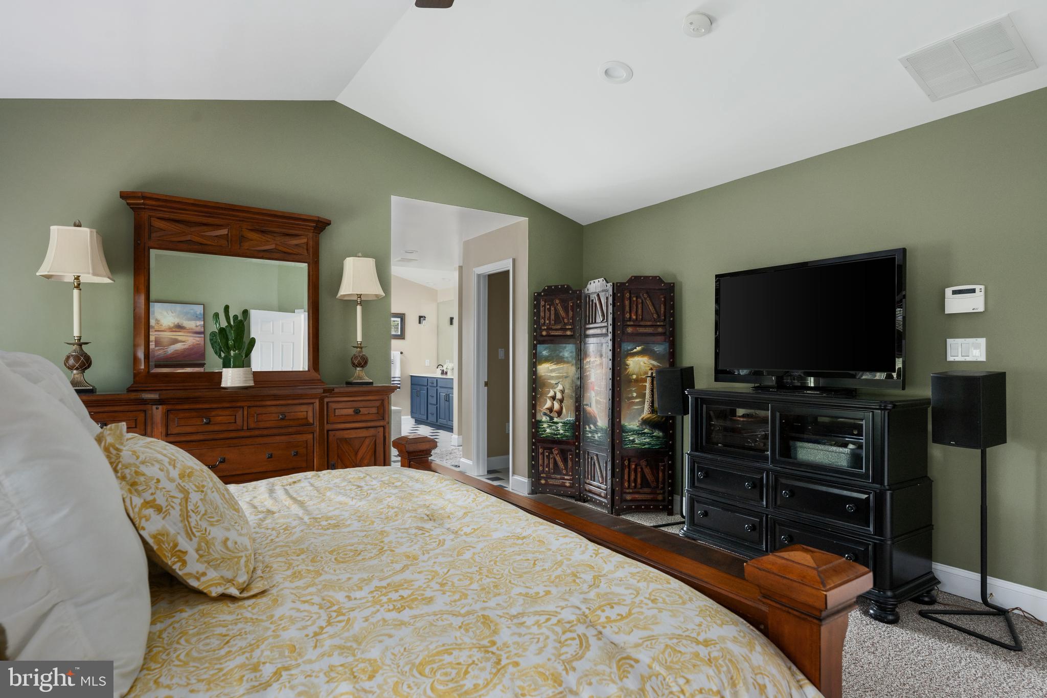 3889 Gamber Road Finksburg, MD 21048 - Photo 32 of 76 a bedroom with a bed and a flat screen tv