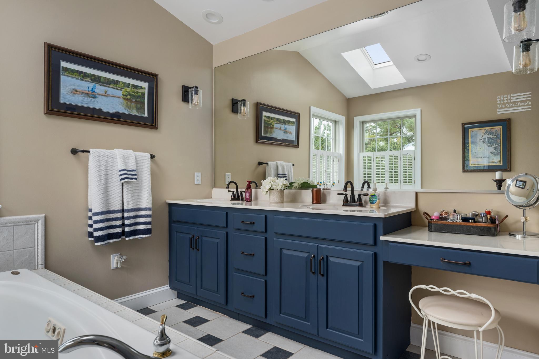 3889 Gamber Road Finksburg, MD 21048 - Photo 34 of 76 a spacious bathroom with a sink double vanity and a mirror