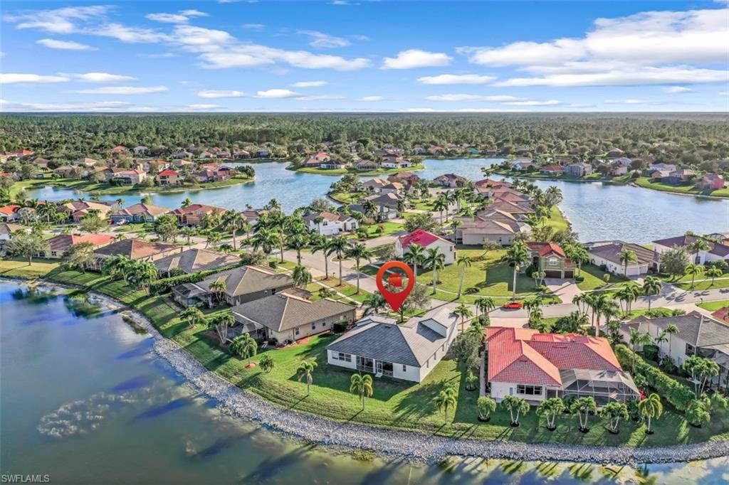 2198 Grove Drive Naples, FL 34120 - Photo 29 of 35 an aerial view of residential houses with outdoor space