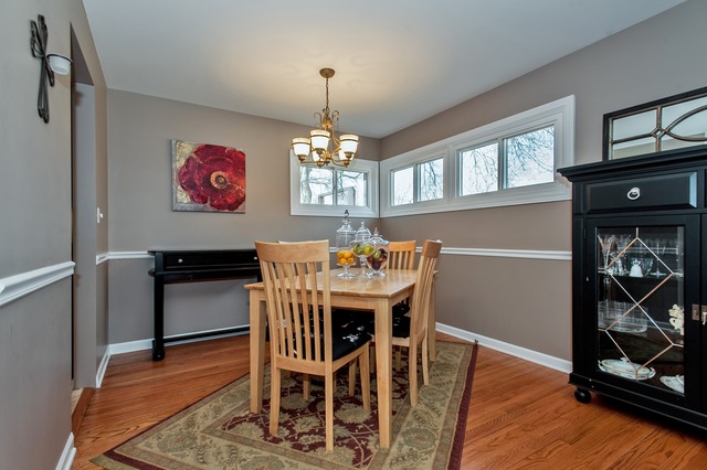 2519 Harrison Street Glenview, IL 60025 - Photo 3 of 10 a view of a dining room with furniture wooden floor and a chandelier