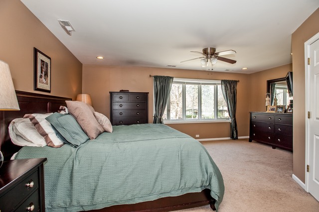2519 Harrison Street Glenview, IL 60025 - Photo 7 of 10 a bedroom with a bed and wooden floor
