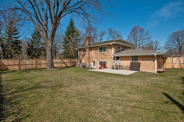 2519 Harrison Street Glenview, IL 60025 - Photo 10 of 10 a front view of a house with garden