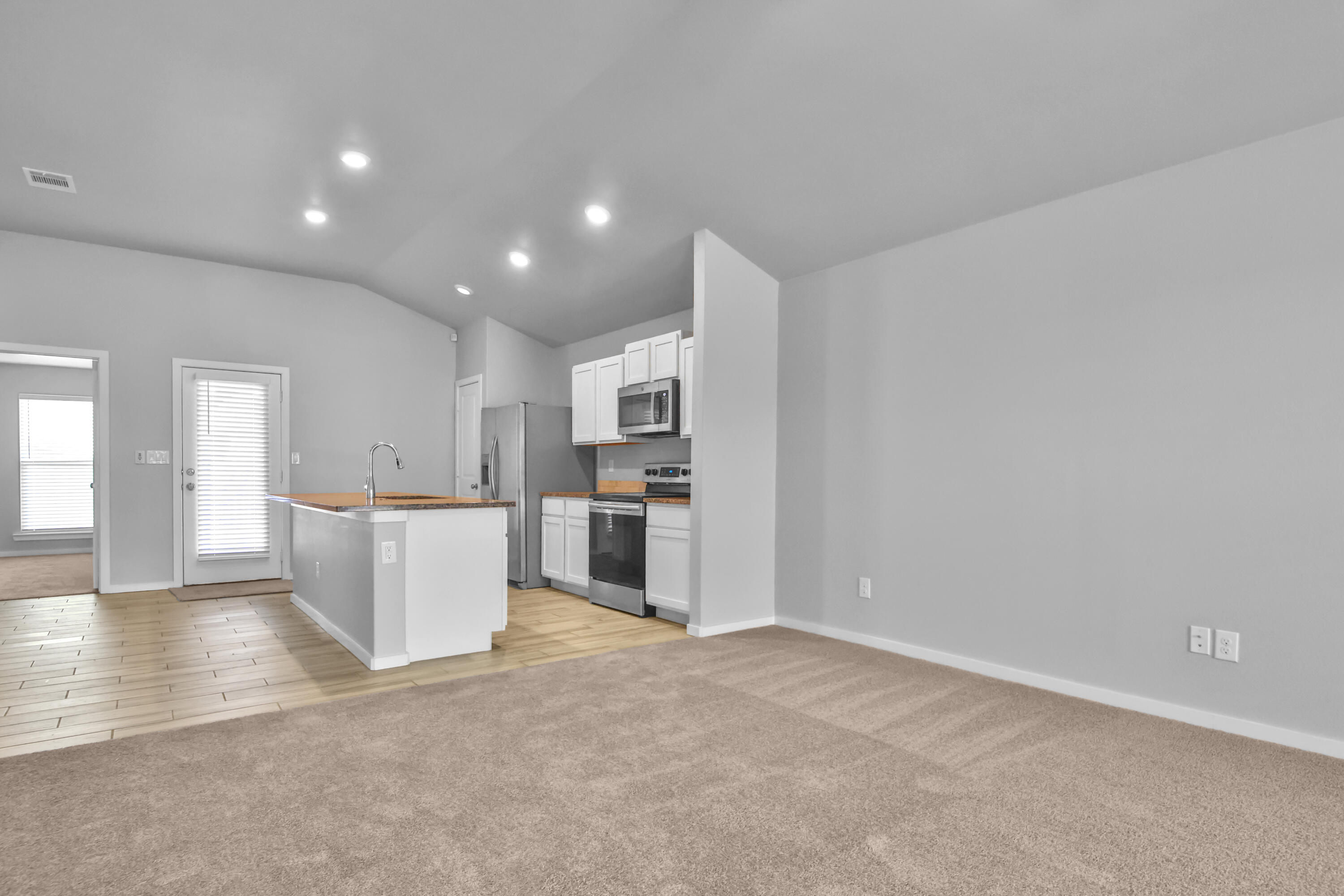 7526 104th Street Lubbock, TX 79424 - Photo 5 of 28 a view of kitchen with furniture and refrigerator
