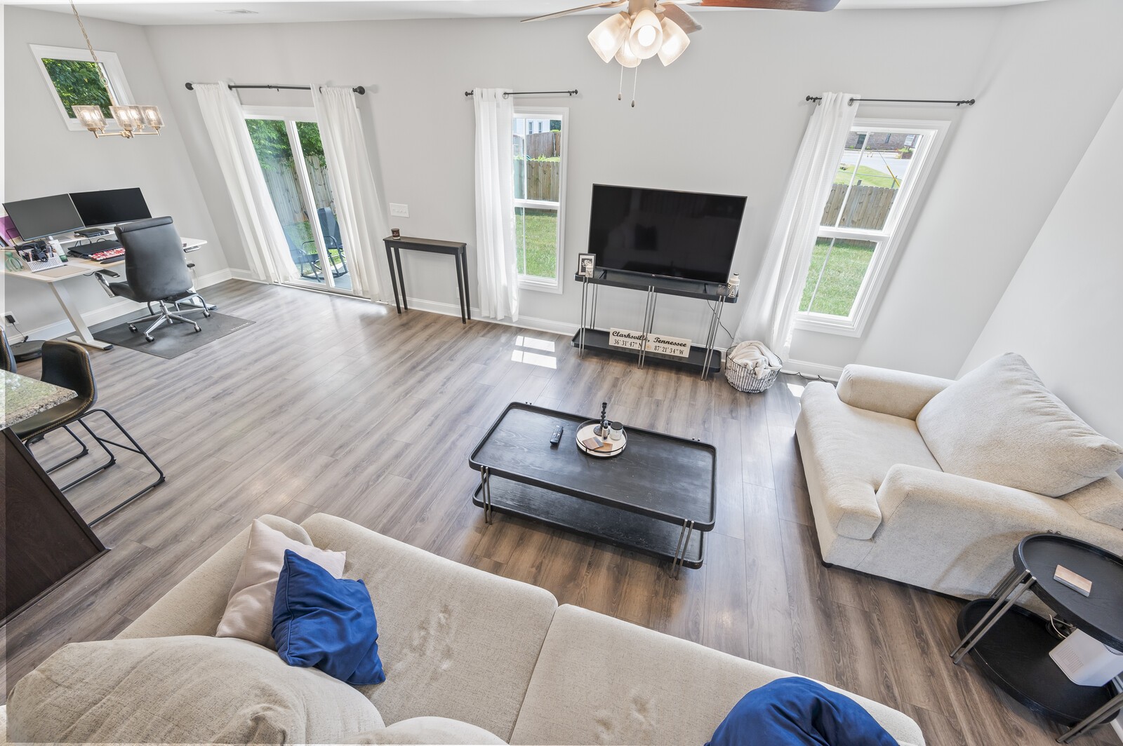 246 King Road Clarksville, TN 37042 - Photo 2 of 21 a living room with furniture and a flat screen tv