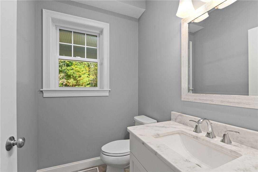 5 Rustic Lane Cumberland, RI 02864 - Photo 16 of 39 Main level guest bathroom