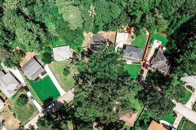 an aerial view of a house with outdoor space