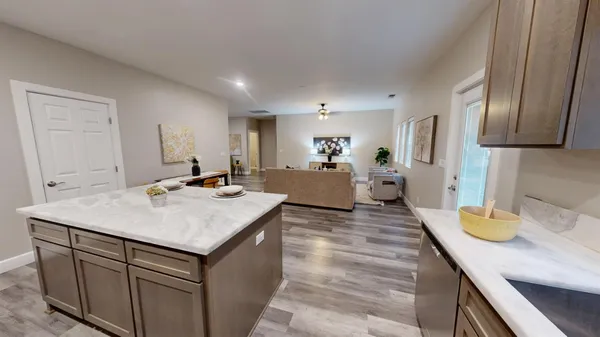 a kitchen with a sink and cabinets