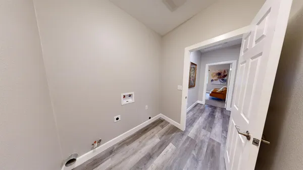 a view of a bedroom from a hallway