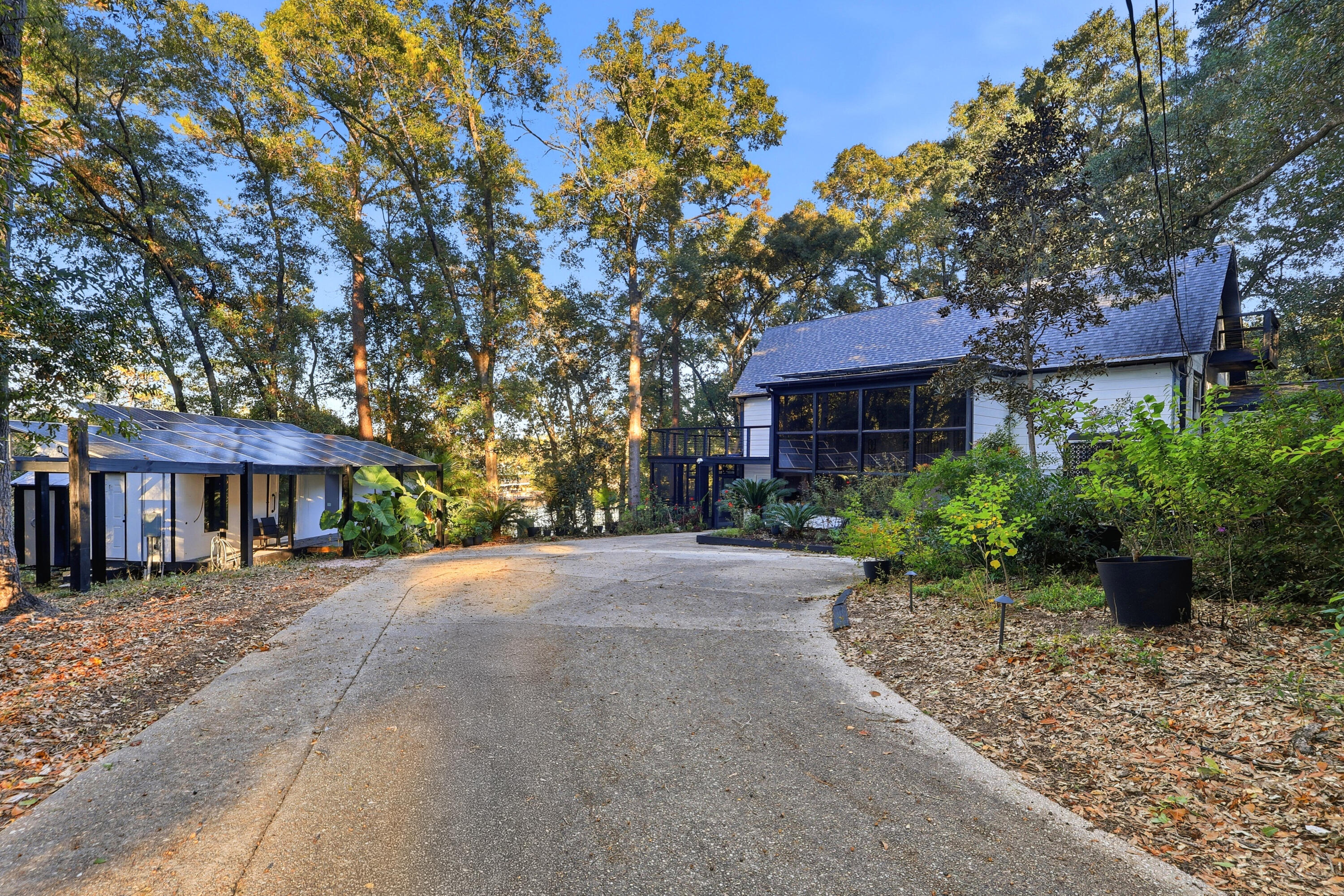 4578 Riley Road Milton, FL 32583 - Photo 1 of 55 a front view of a house with garden