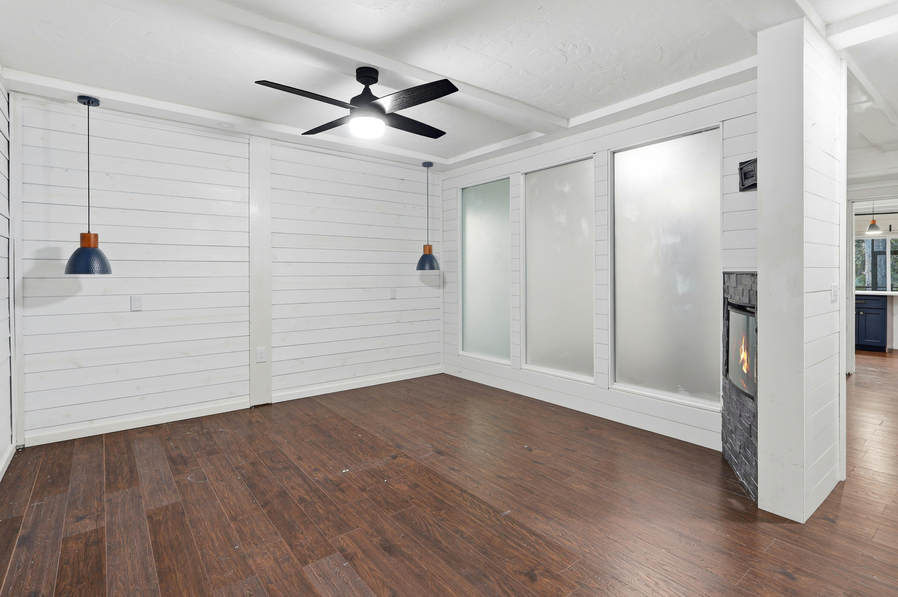 4578 Riley Road Milton, FL 32583 - Photo 11 of 55 a view of empty room with wooden floor