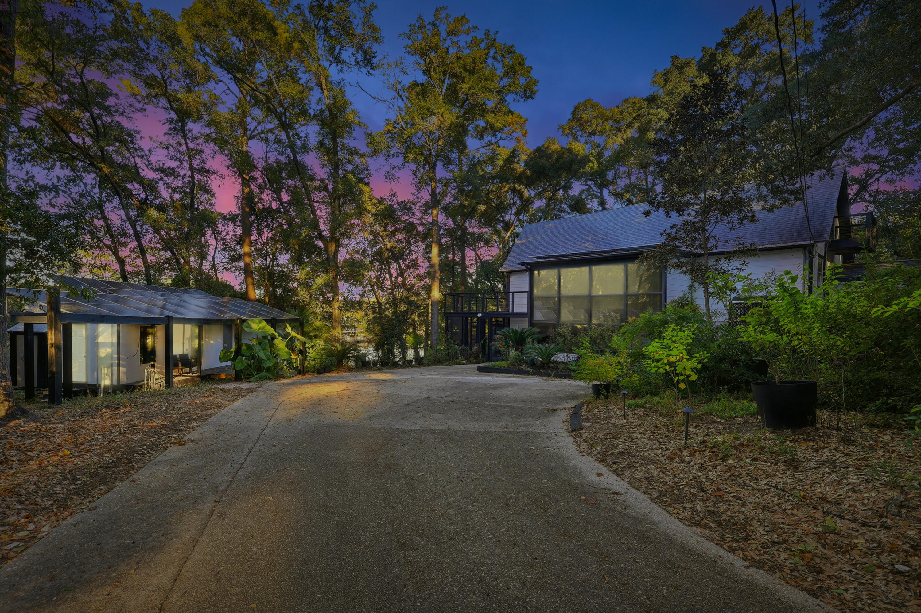 4578 Riley Road Milton, FL 32583 - Photo 2 of 55 a front view of a house with garden