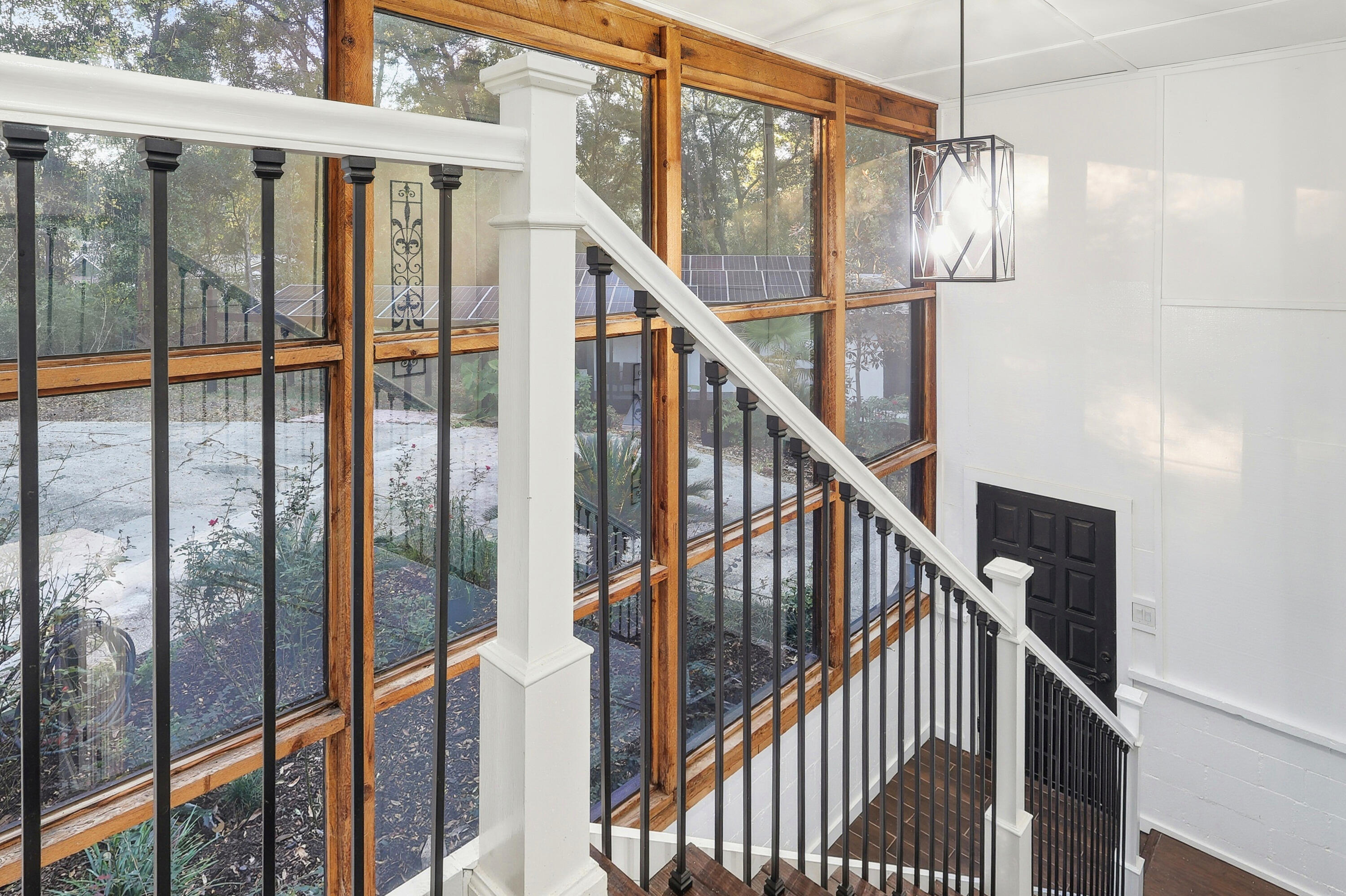 4578 Riley Road Milton, FL 32583 - Photo 25 of 55 a view of staircase with railing and white walls