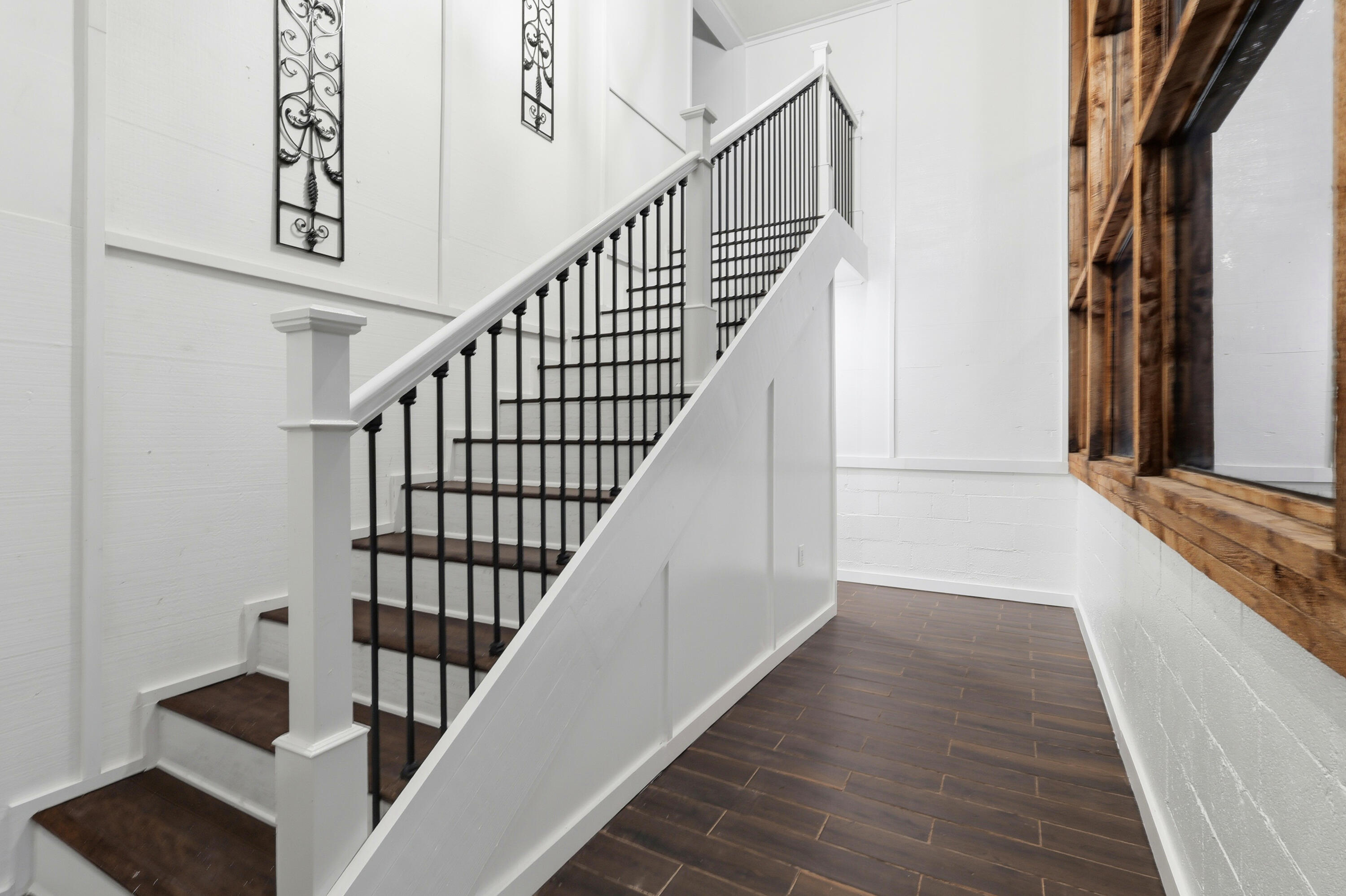 4578 Riley Road Milton, FL 32583 - Photo 26 of 55 a view of entryway and hall with wooden floor