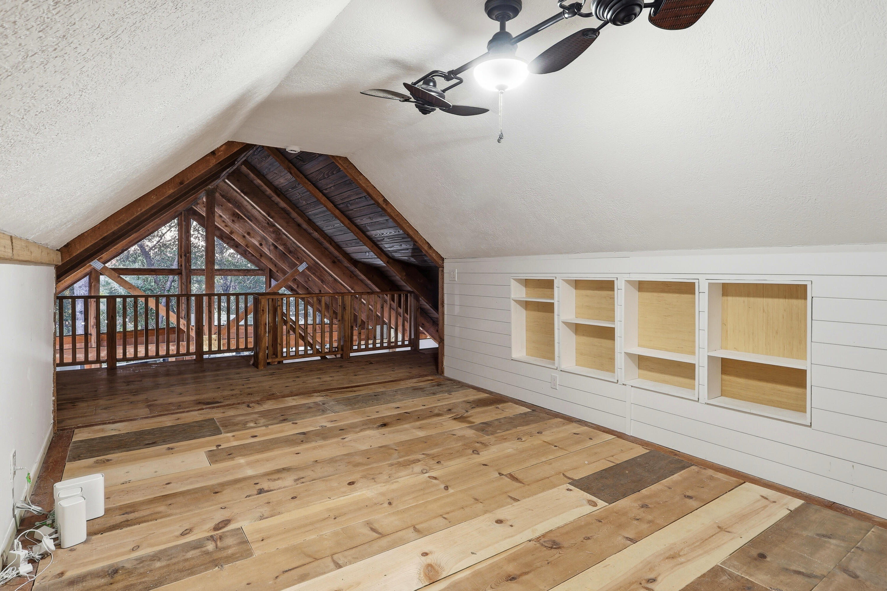 4578 Riley Road Milton, FL 32583 - Photo 27 of 55 wooden floor in a hall with a window and wooden floor