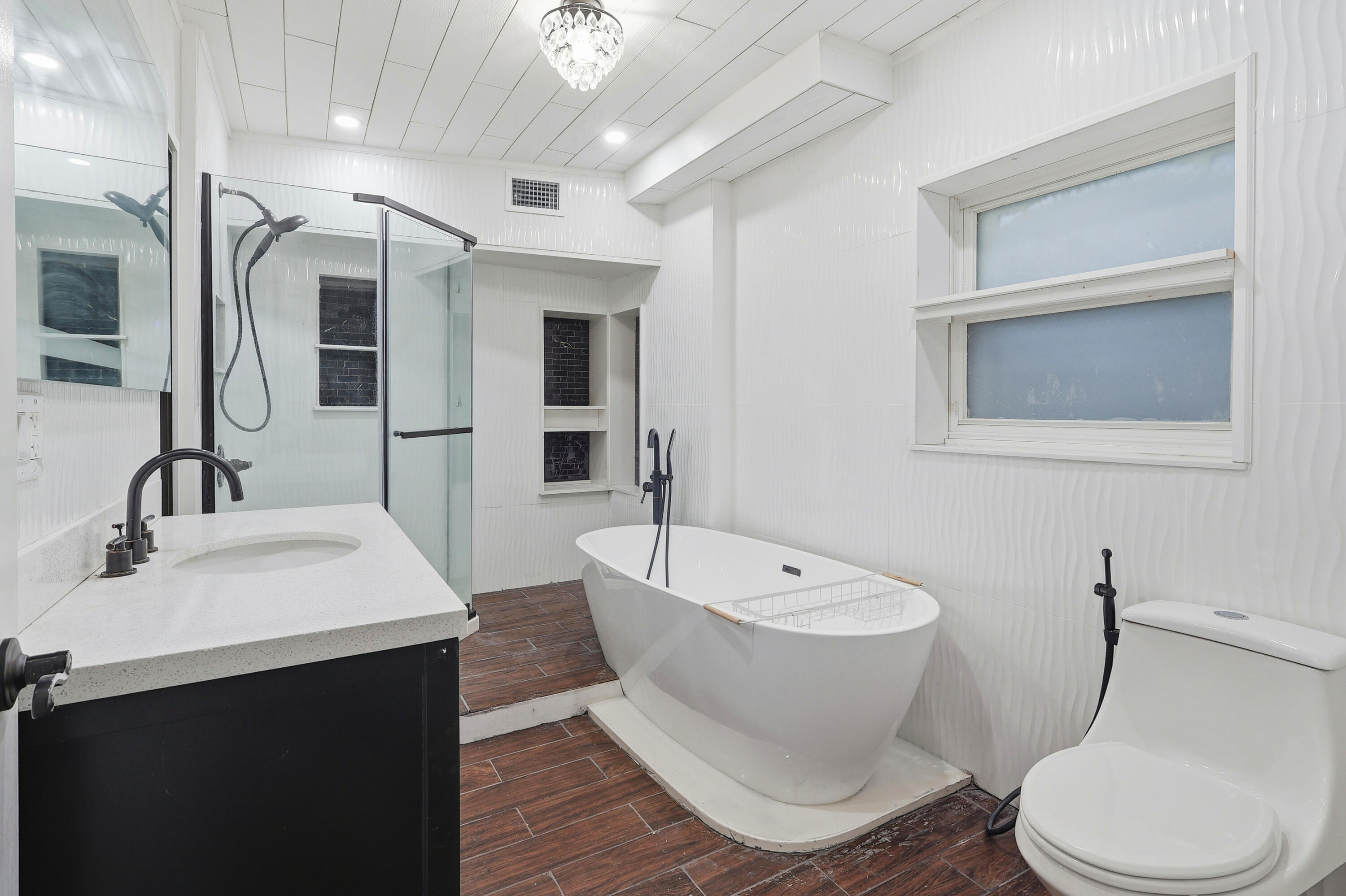 4578 Riley Road Milton, FL 32583 - Photo 34 of 55 a white toilet sitting next to a bathroom sink