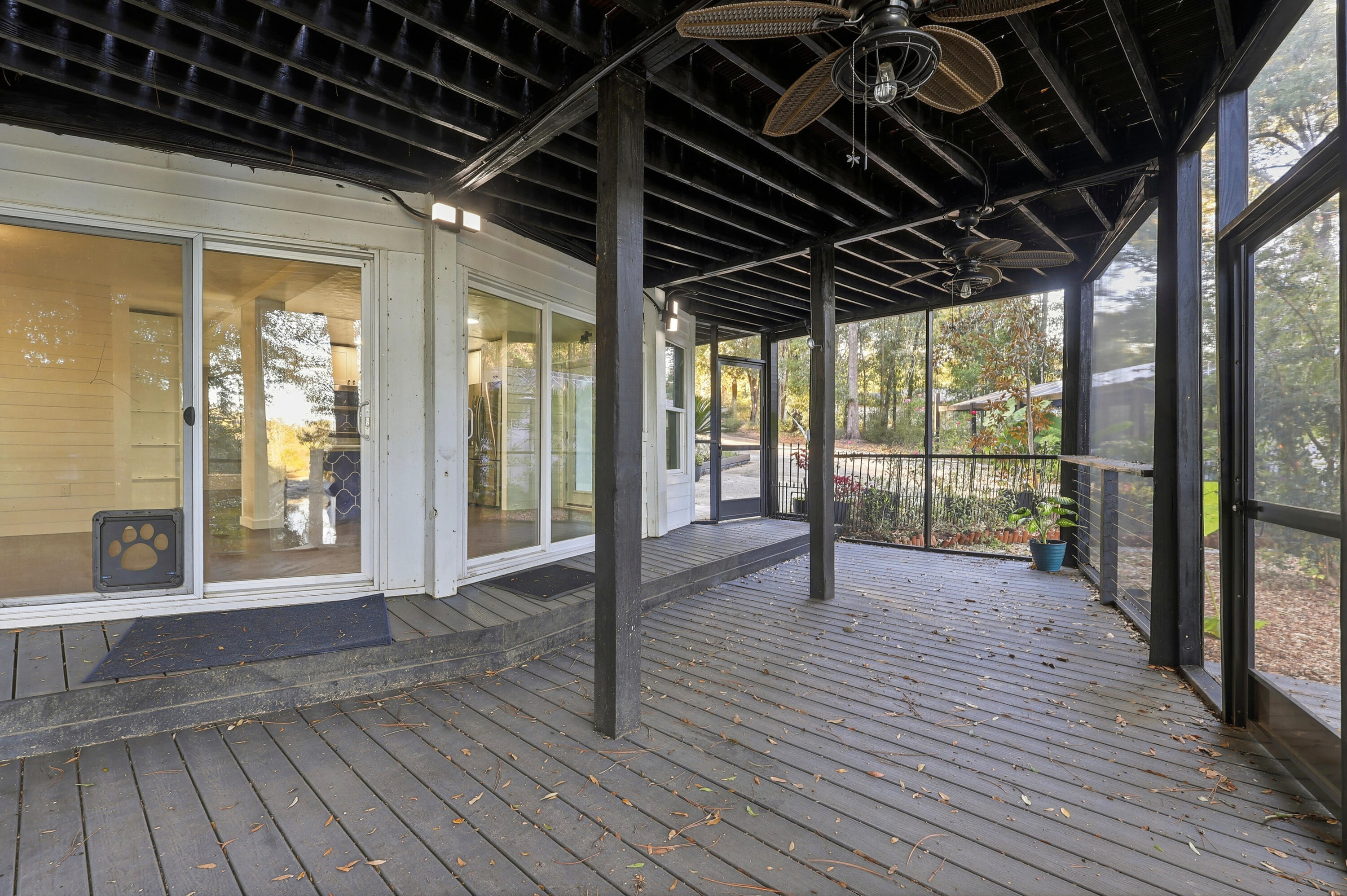 4578 Riley Road Milton, FL 32583 - Photo 41 of 55 a view of porch with wooden floor