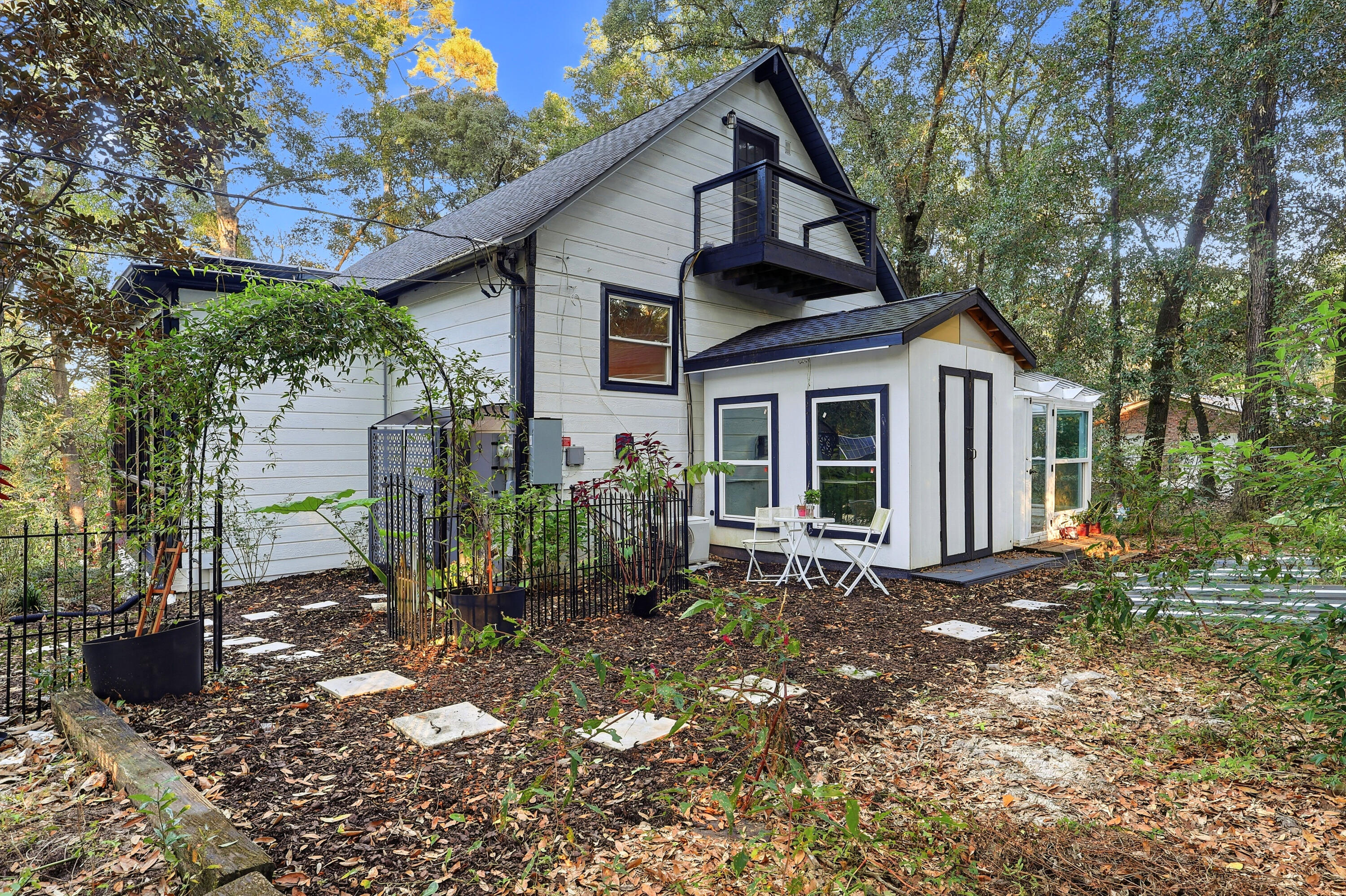 4578 Riley Road Milton, FL 32583 - Photo 52 of 55 a front view of a house with garden