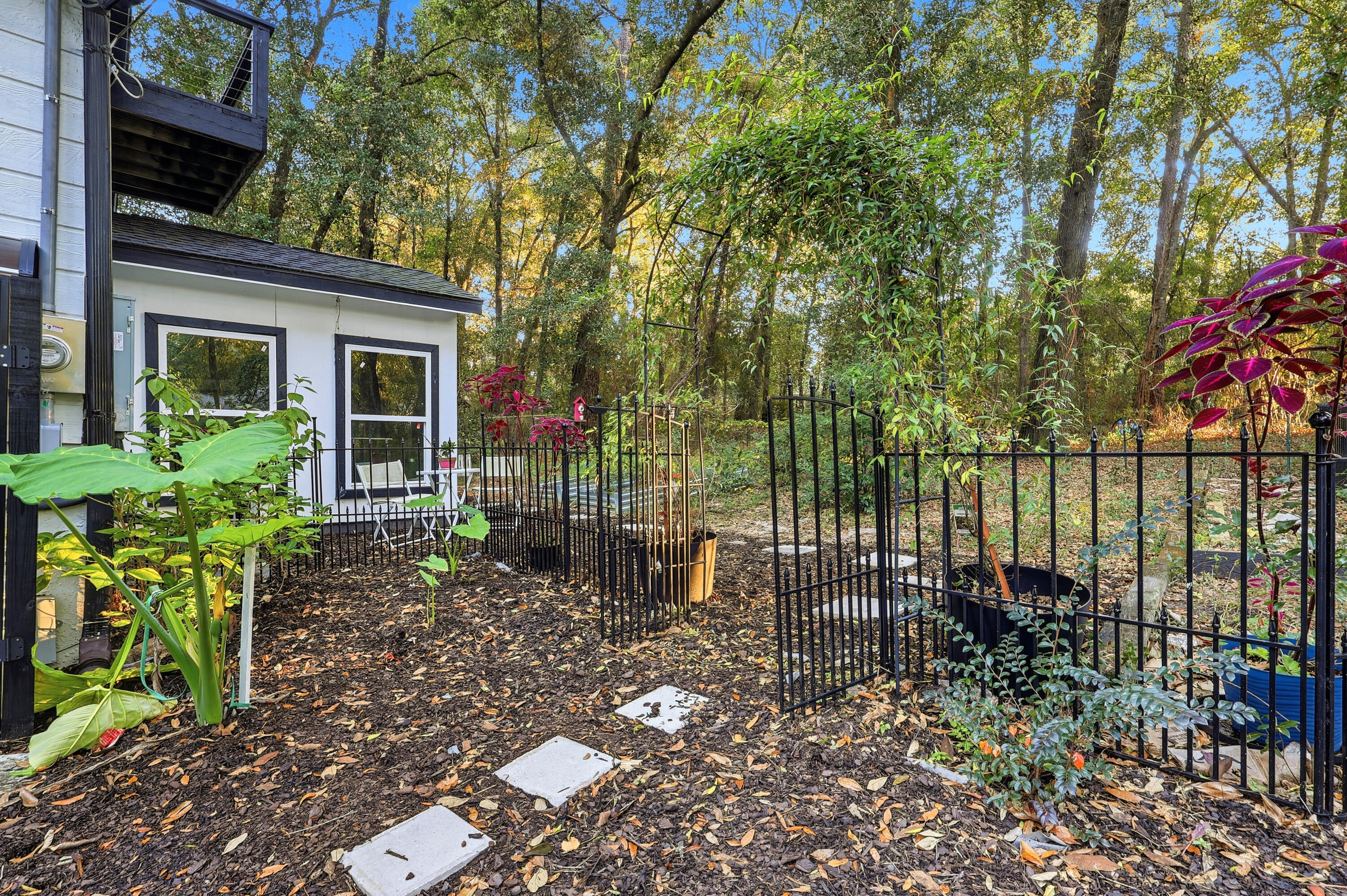 4578 Riley Road Milton, FL 32583 - Photo 53 of 55 a view of a chair and table in backyard