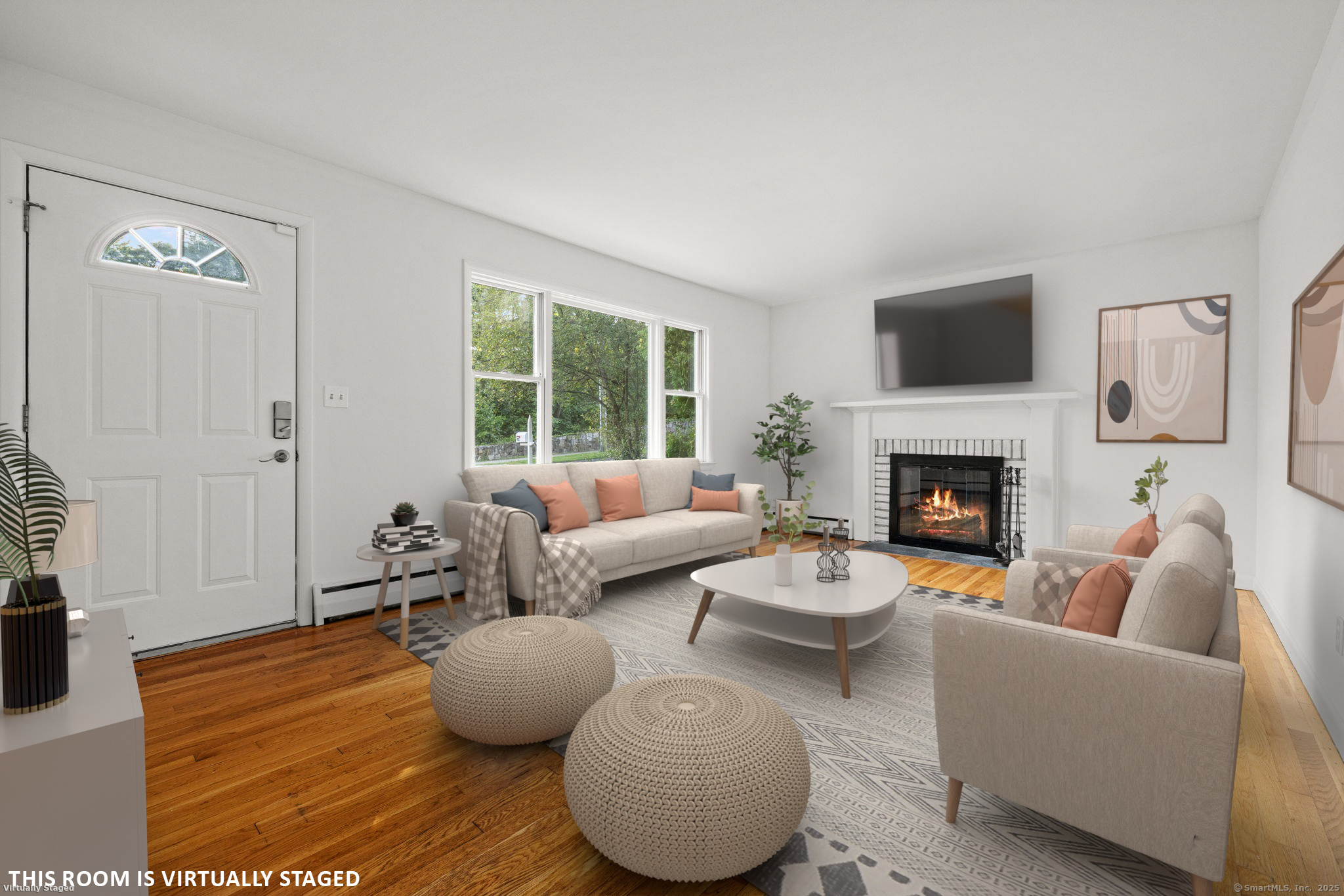 a living room with furniture and a fireplace