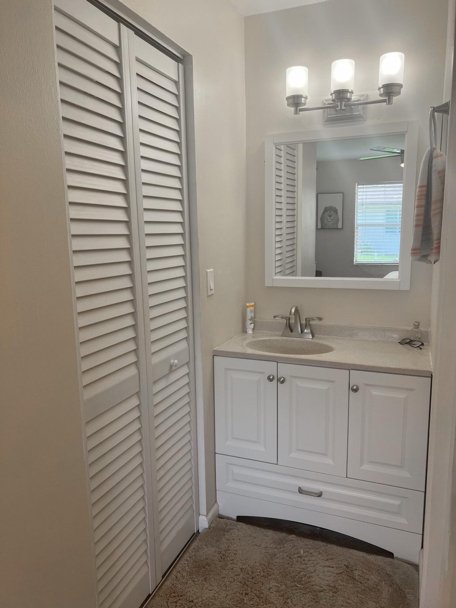 136 Doe Trail Jupiter, FL 33458 - Photo 12 of 38 Primary Bath Vanity