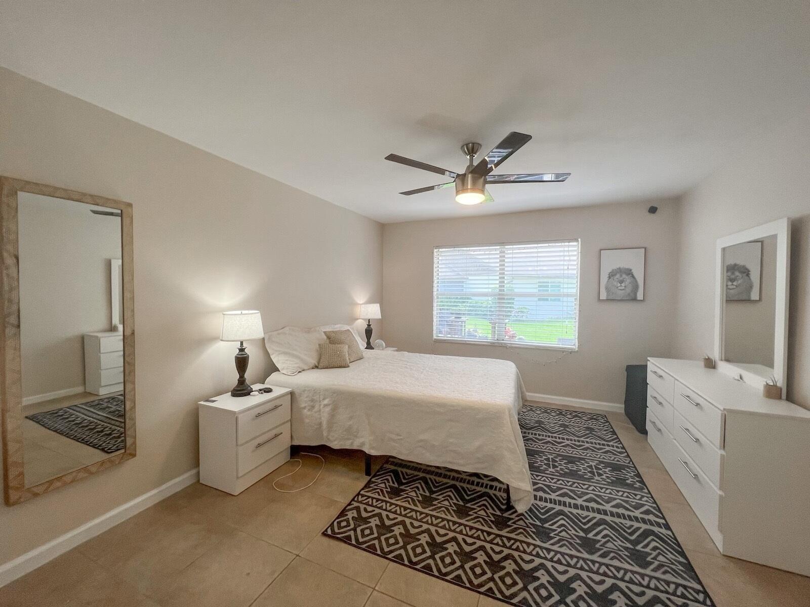 136 Doe Trail Jupiter, FL 33458 - Photo 9 of 38 Primary Bedroom