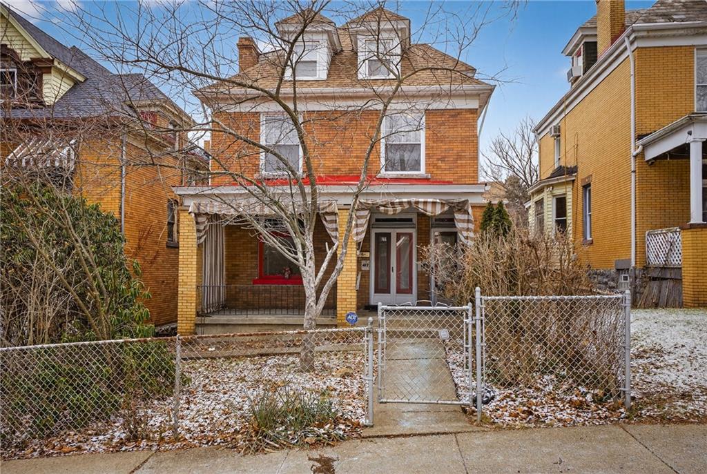 417 Zara Street Pittsburgh, PA 15210 - Photo 1 of 47 front view of a house with a small yard