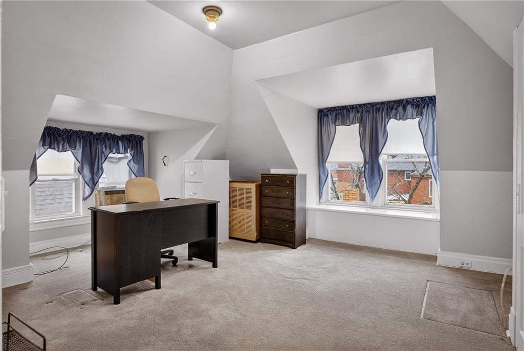 417 Zara Street Pittsburgh, PA 15210 - Photo 43 of 47 a room with furniture and a window