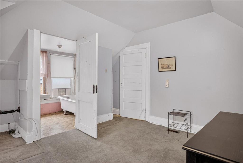 417 Zara Street Pittsburgh, PA 15210 - Photo 44 of 47 a living room with furniture and a window