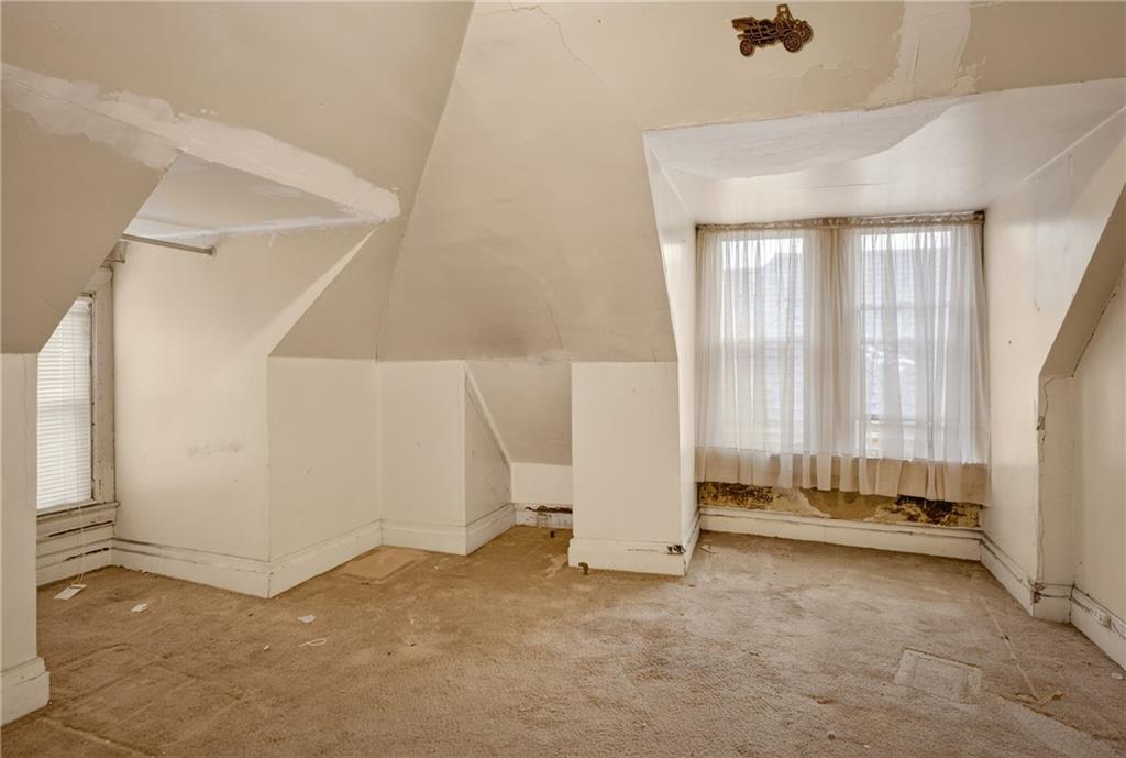 417 Zara Street Pittsburgh, PA 15210 - Photo 46 of 47 a view of an empty room with a window