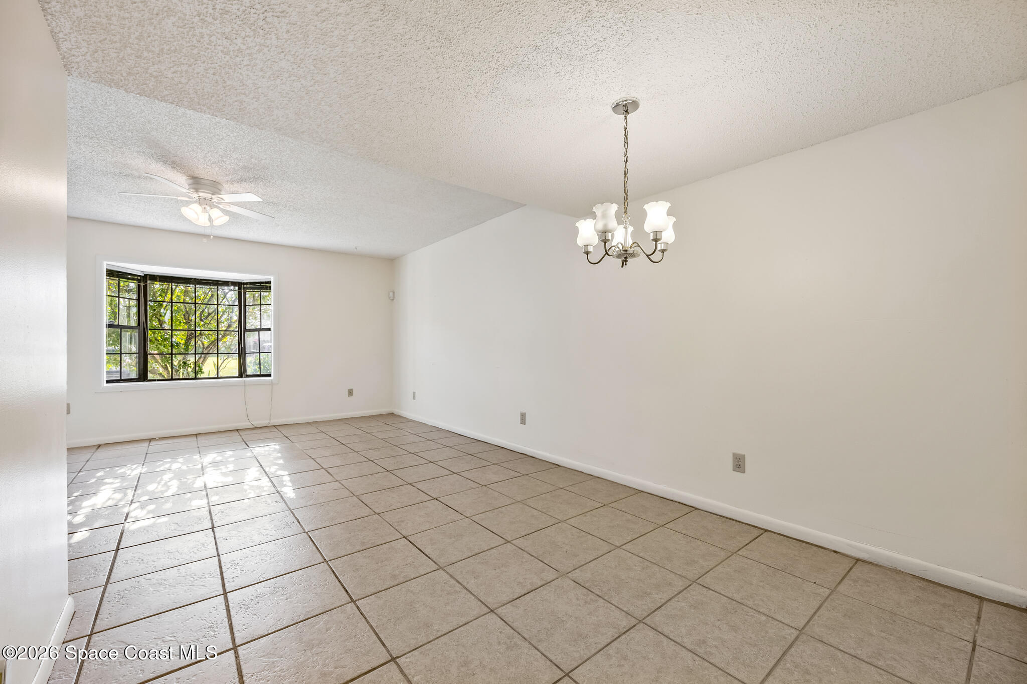 2016 Manor Drive Northeast Palm Bay, FL 32905 - Photo 14 of 29 a view of an empty room with window