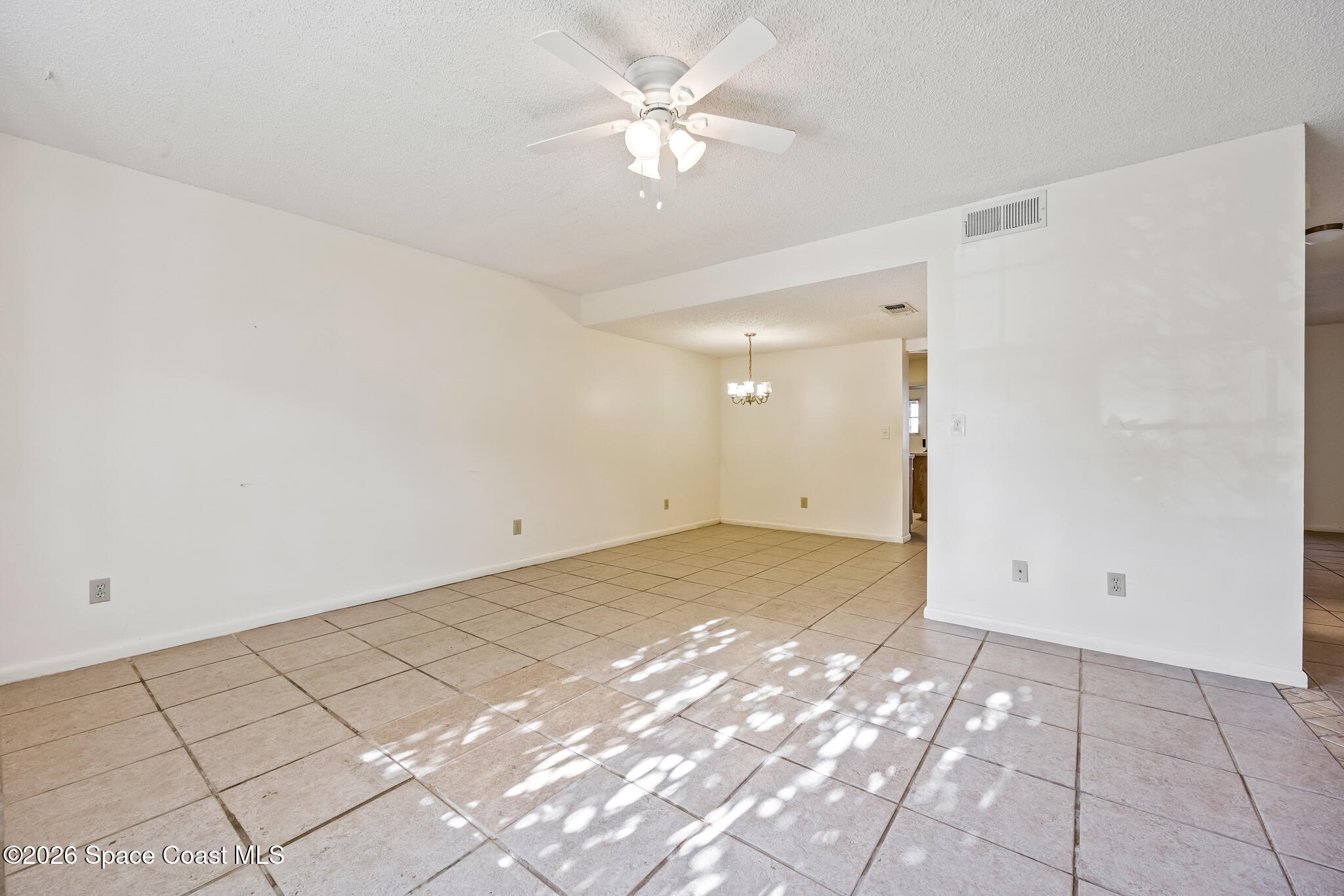 2016 Manor Drive Northeast Palm Bay, FL 32905 - Photo 17 of 29 a view of a big room with carpet