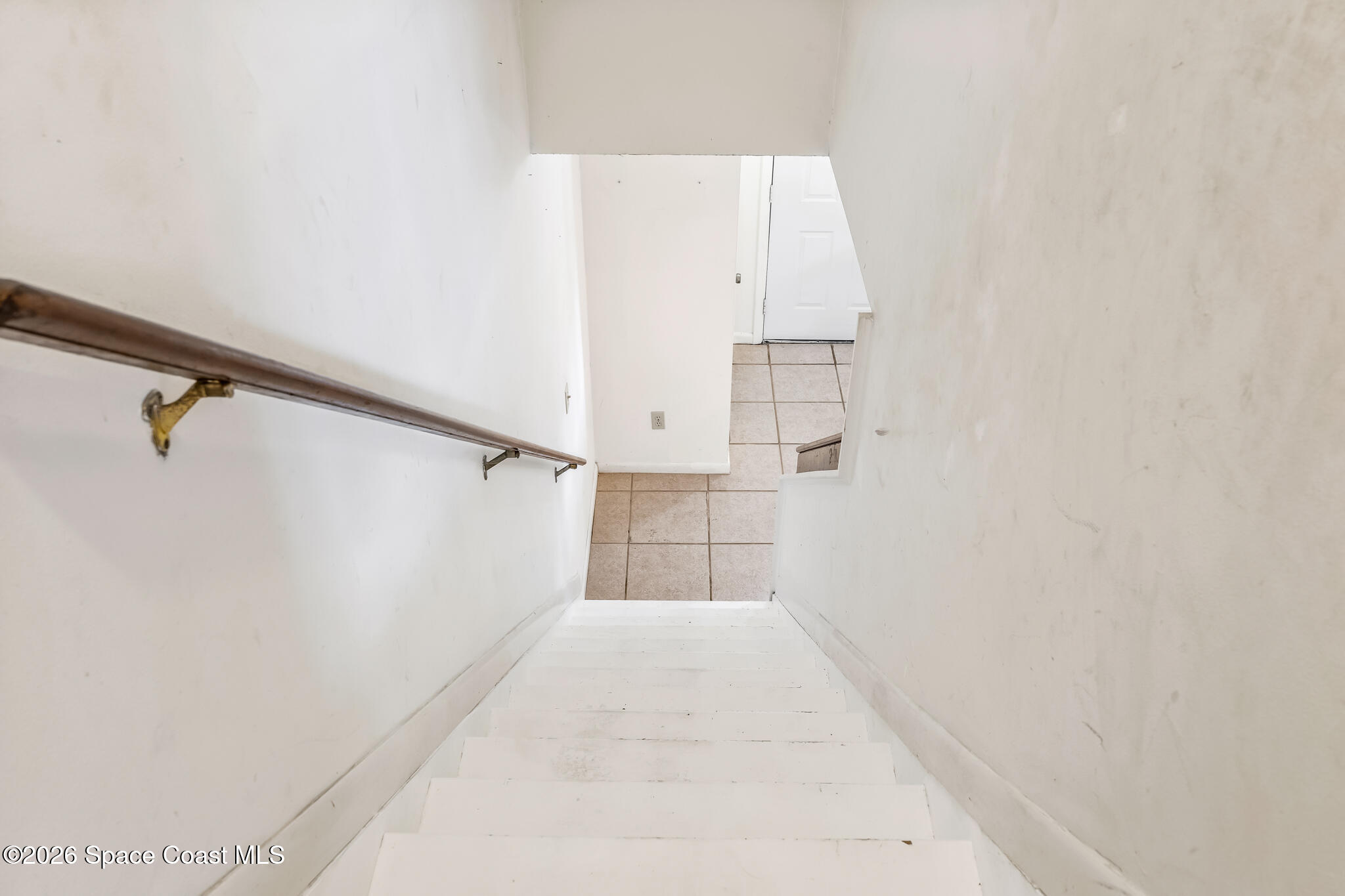 2016 Manor Drive Northeast Palm Bay, FL 32905 - Photo 19 of 29 a view of a hallway with stairs