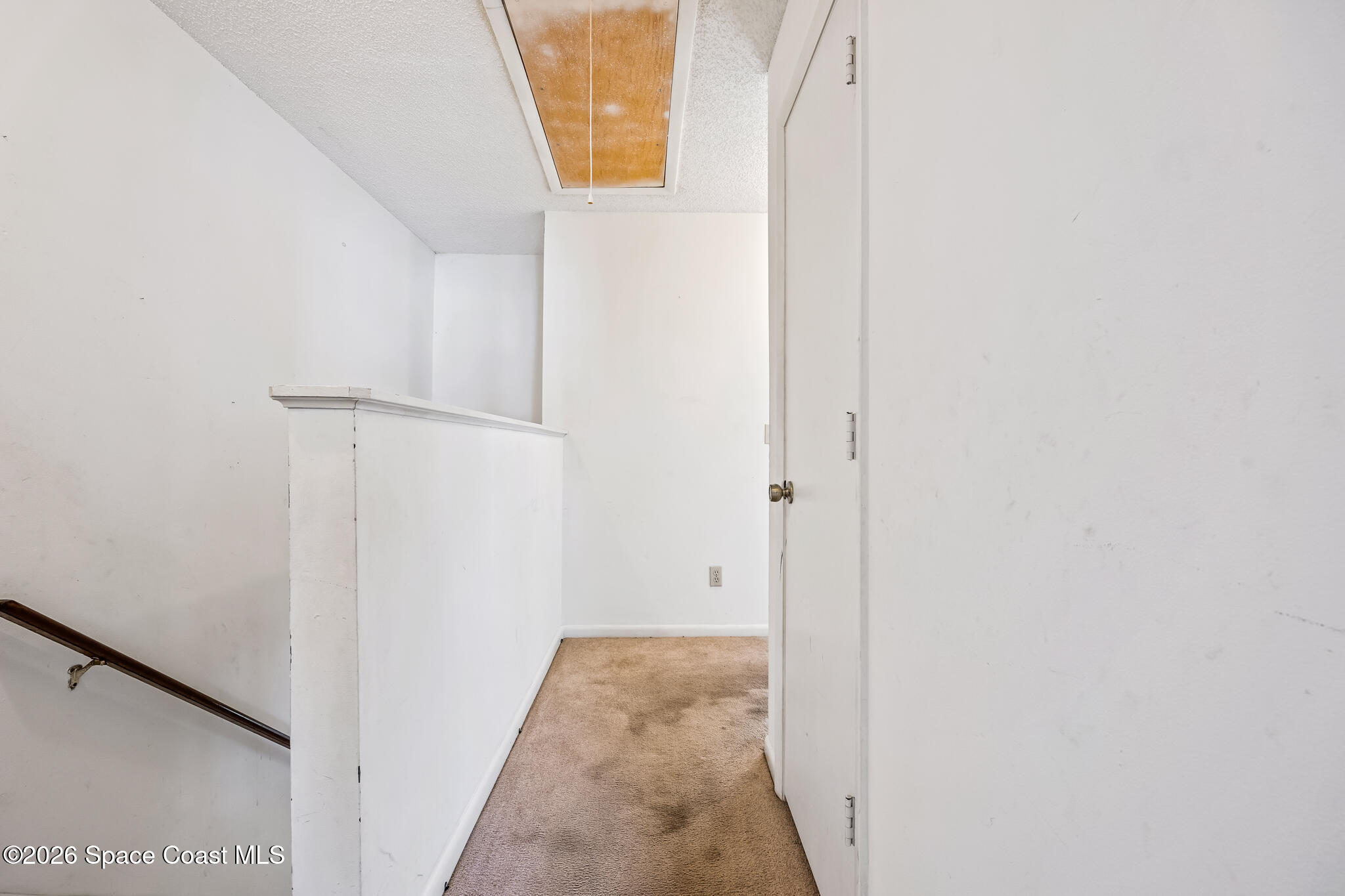 2016 Manor Drive Northeast Palm Bay, FL 32905 - Photo 23 of 29 a view of a bathroom from a hallway
