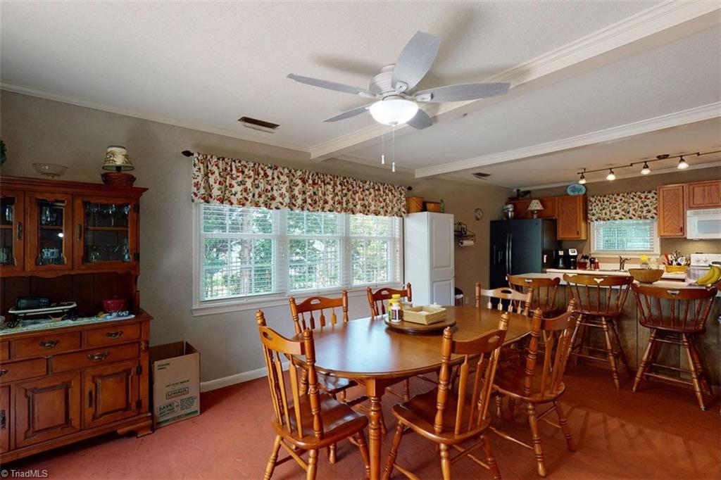780 Cedar Branch Road Denton, NC 27239 - Photo 14 of 29 Kitchen and dining area. All kitchen appliances plus washer and dryer are included.