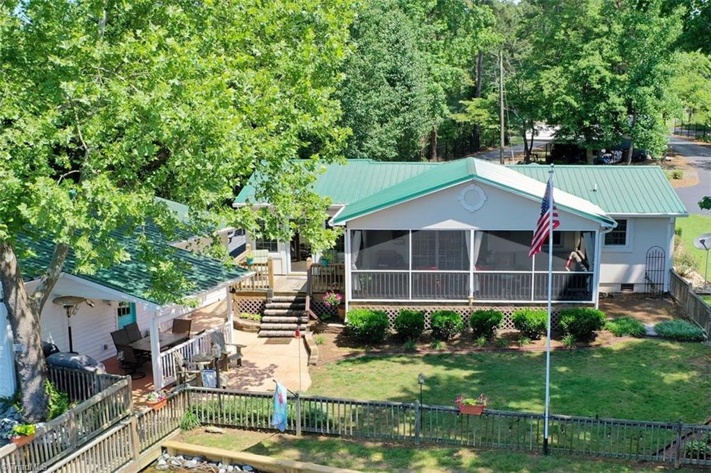 780 Cedar Branch Road Denton, NC 27239 - Photo 26 of 29 Fully fenced yard, screened porch, boat house, private pier, new sea wall and rip rap, great outdoor entertaining areas - what more could you ask for?