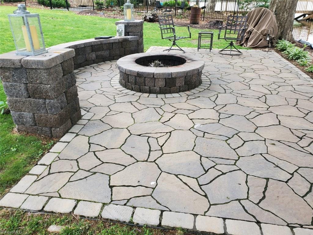 780 Cedar Branch Road Denton, NC 27239 - Photo 5 of 29 Wow! What a fantastic seating area right beside the lake to spend those lazy summer evenings! New in 2019.