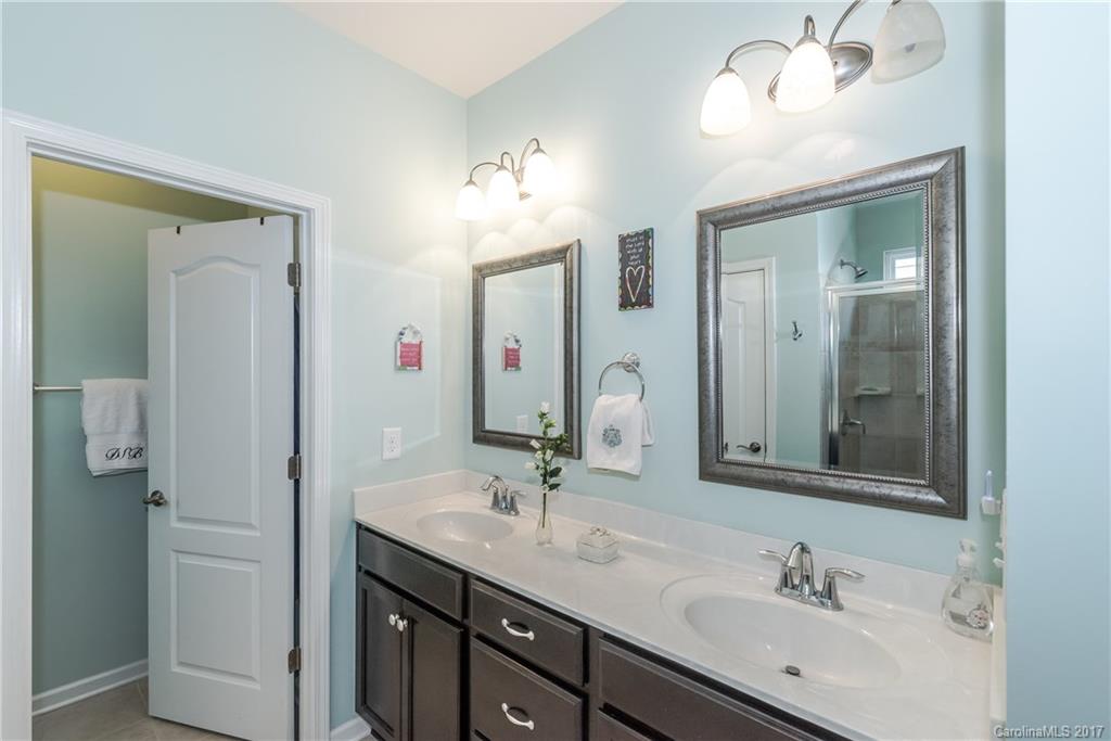 4285 Perth Road Indian Land, SC 29707 - Photo 11 of 24 a bathroom with a double vanity sink and a mirror