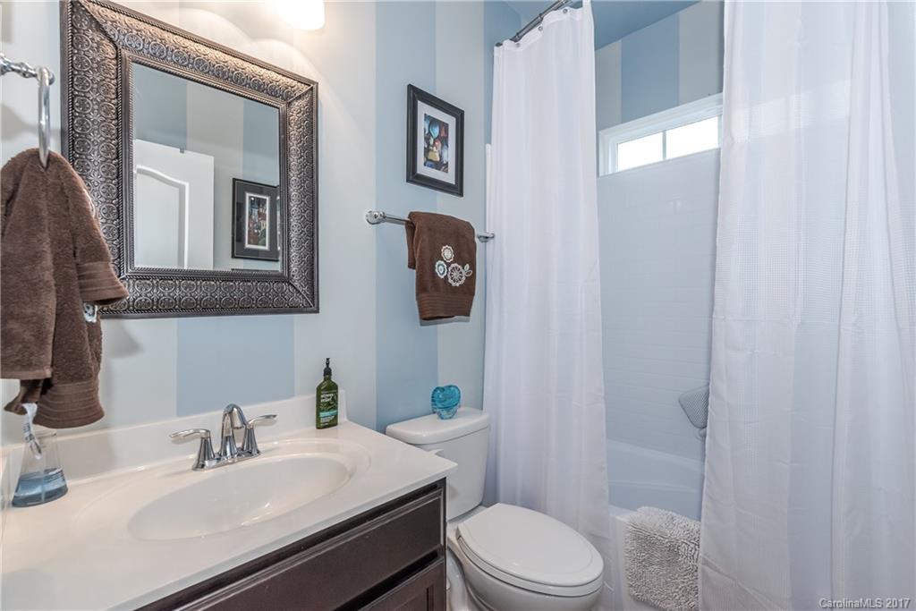4285 Perth Road Indian Land, SC 29707 - Photo 13 of 24 a bathroom with a sink vanity mirror and toilet