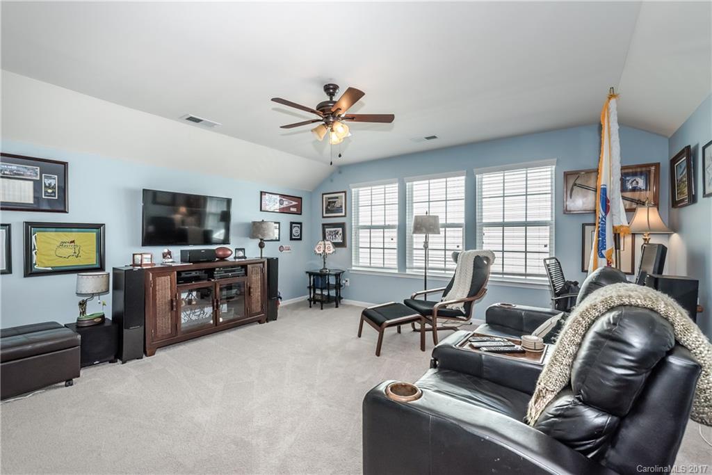 4285 Perth Road Indian Land, SC 29707 - Photo 14 of 24 a living room with furniture and a flat screen tv