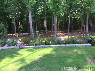 4285 Perth Road Indian Land, SC 29707 - Photo 22 of 24 a view of a garden with flowers and trees
